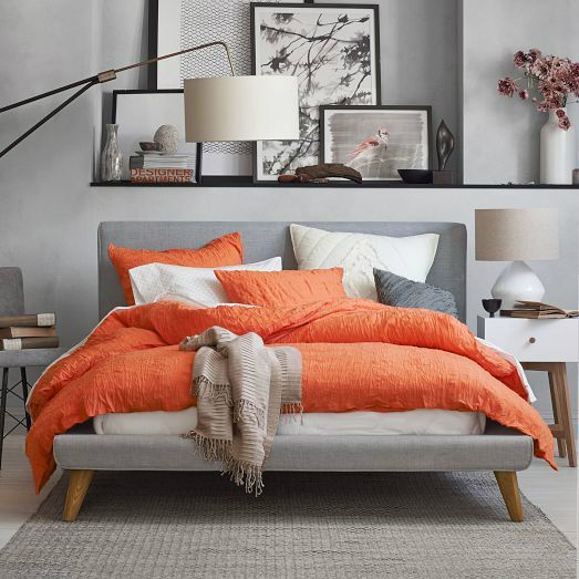Palette colore bianco, grigio e arancione  per la camera da letto