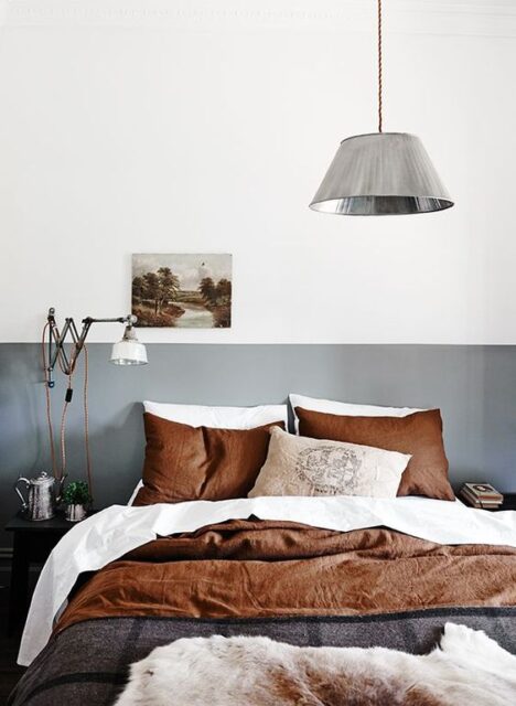 Colori caldi per i tessuti della camera da letto